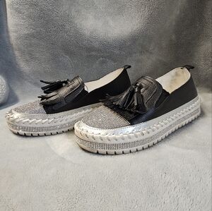 Black and silver moccasins